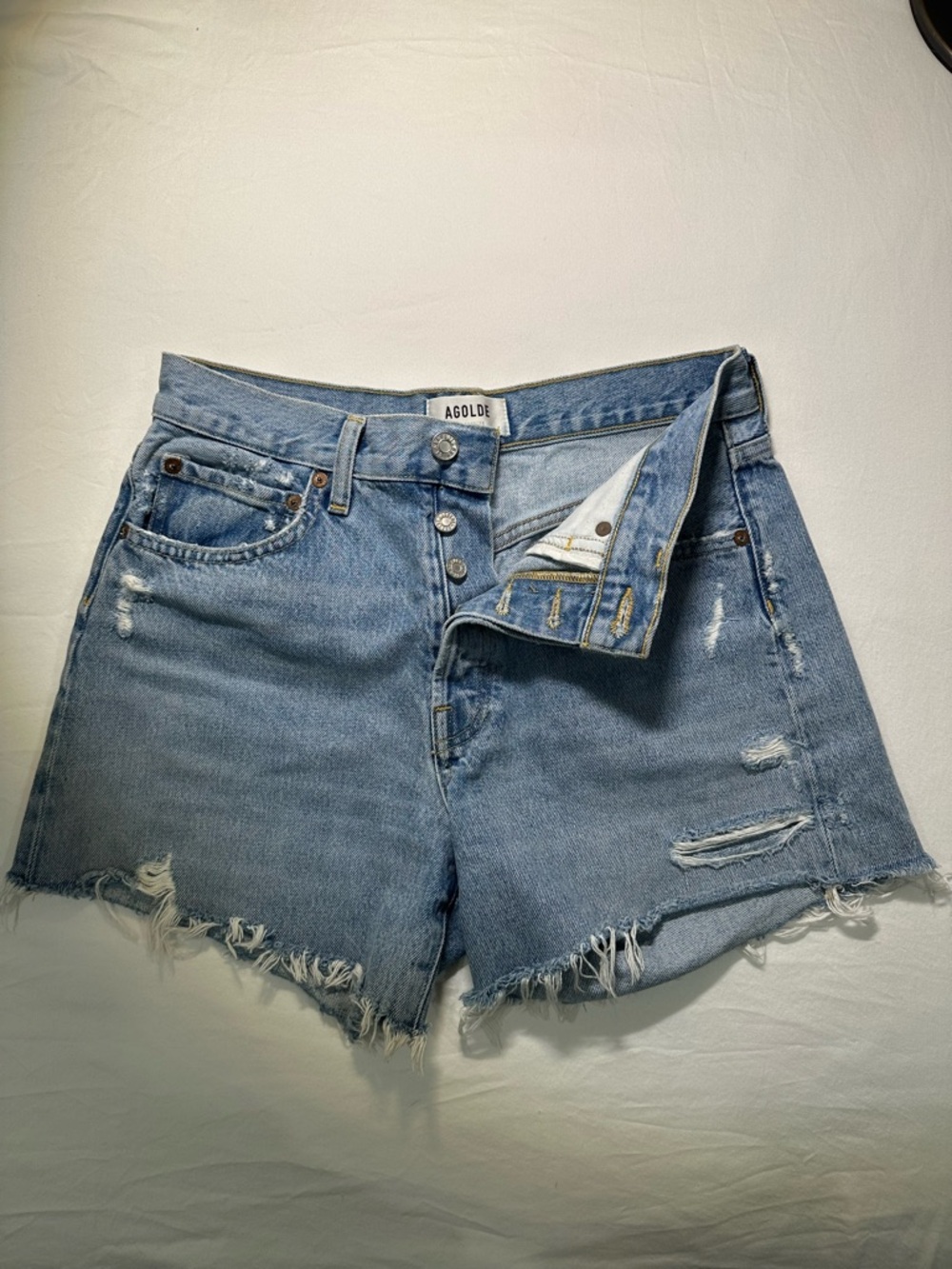 Agolde Light Wash Distressed Denim Shorts